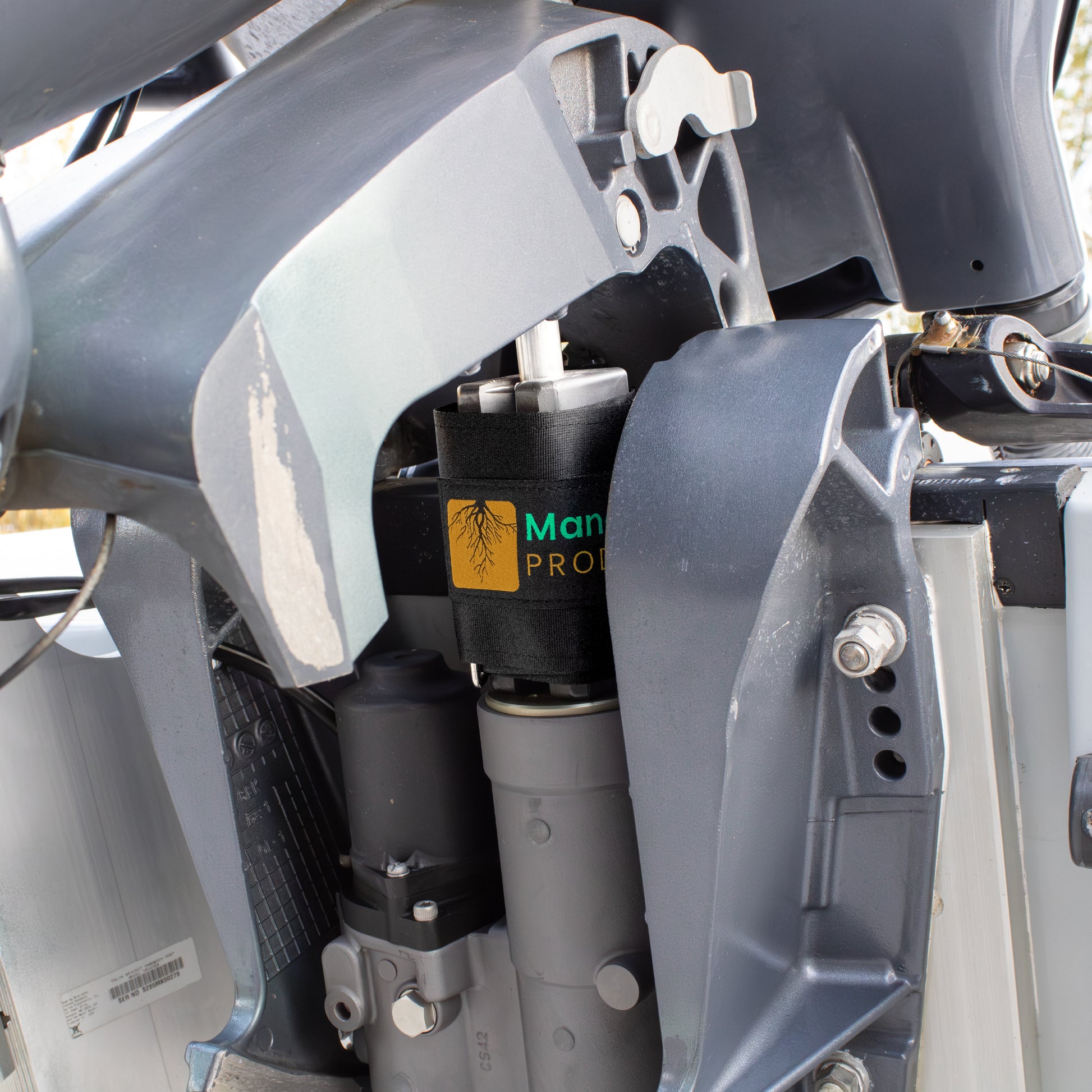 Transom Saver TS-Block with Transom Saver Strap on outboard motor